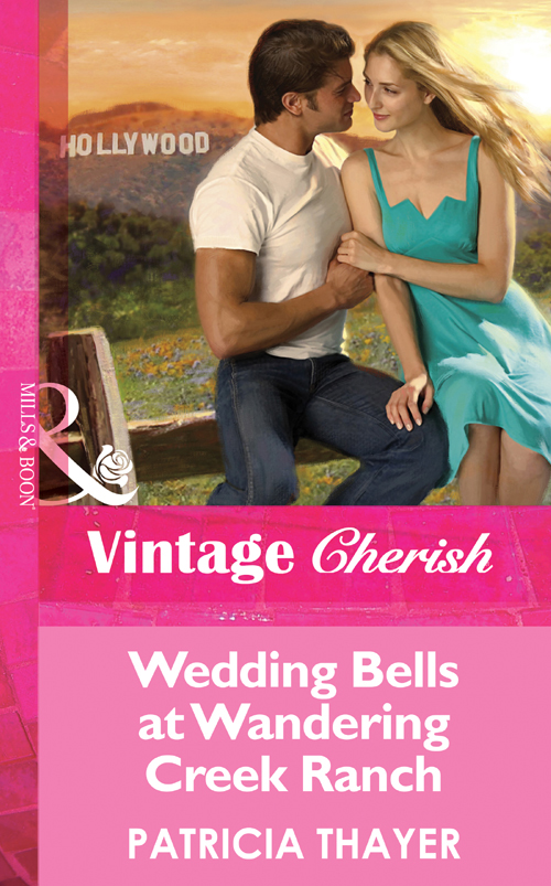 Обложка книги «Wedding Bells at Wandering Creek»