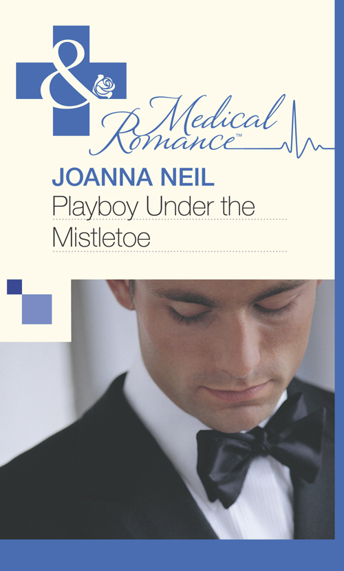 Обложка книги «Playboy Under the Mistletoe»
